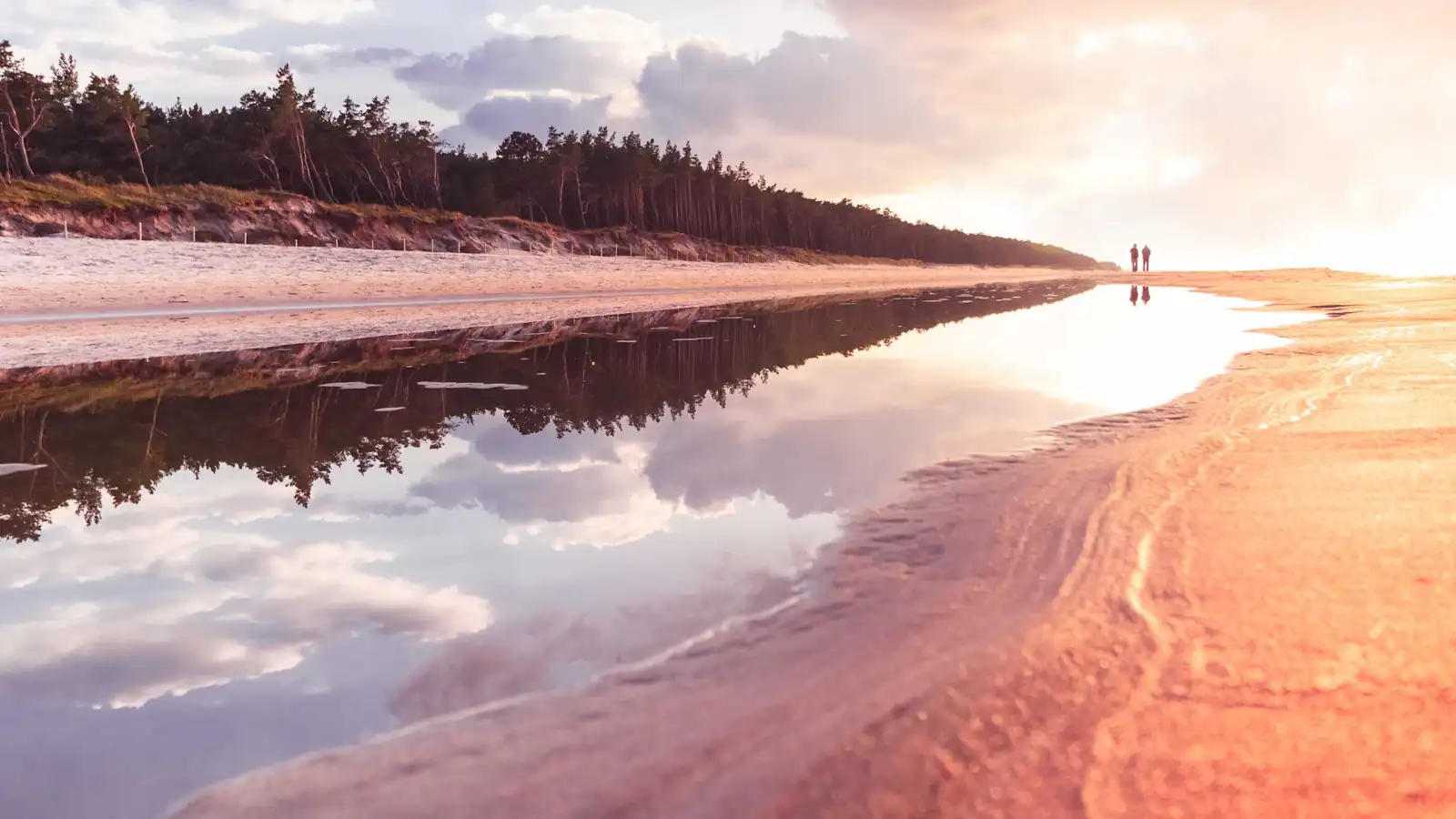 body of water during sunset